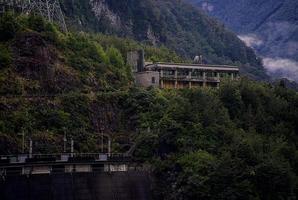 old power station hiden in the forest photo