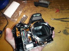 Repair of a digital SLR camera, microelectronics photo