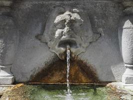 ancient fountain water jet photo