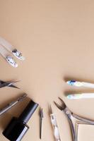 Manicure tools and tips with copy space drawings photo