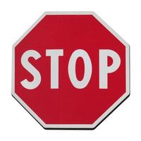 señal de stop aislado sobre blanco foto