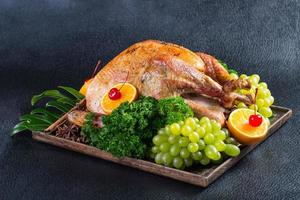 Roast Turkey on wood table photo