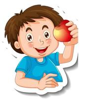 Sticker template with a boy holding an apple isolated vector