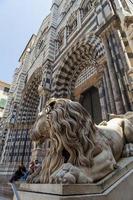 GENOA, ITALY, JUNE 2, 2015 - Unidentified people by the Genoa Cathedral in Italy. Genoa Cathedral is a Roman Catholic cathedral dedicated to Saint Lawrence and is the seat of the Archbishop of Genoa. photo