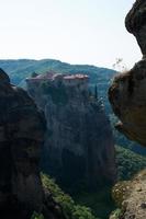 Orthodox Monastery on a cliff at Meteora, Greece photo