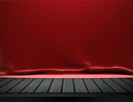 Wood table with red velvet cloth background photo