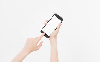 hand hold black phone. Cellular isolated on white clipping path inside. Top view.Mock up.Copy space.Template.Blank. photo