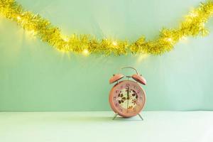 Minimalist concept idea displaying products. christmas and new year backgrounds. alarm clock photo