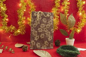 Christmas and New Year's Minimalist Concept. paper bag on Christmas And New Year's Minimalist Background. photo