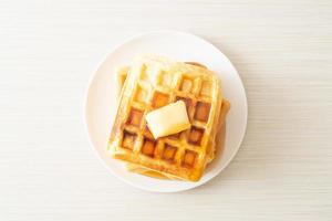 waffle stack with butter and honey photo