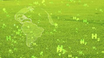 global digital and america continent with bubbles green H2 text particles flying on green grass background photo