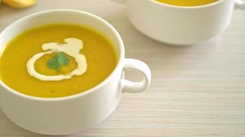 Pumpkin soup in white bowl video