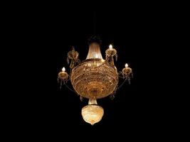 vintage chandelier, warm yellow light photo