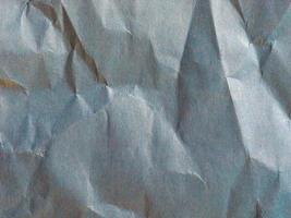 blue crinkled paper texture background photo