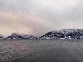 Winter landscape fjord sunrise sunset, Norway. Ferry Vangsnes to Balestrand. photo