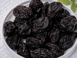 Pitted prunes served photo