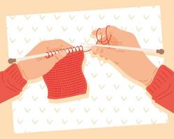 Hands holdigng knitting needles with pattern vector