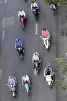 HO CHI MINH, VIETNAM, FEBRUARY 22, 2017 - Unidentified people on the street of Ho Chi Minh, Vietnam. Ho Chi Minh is the largest city in Vietnam. photo