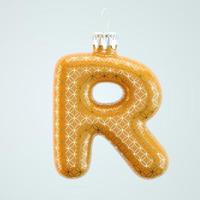 Orange letter R Christmas toy with golden pattern isolated white background 3d render photo