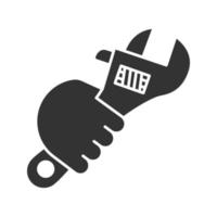 Hand holding wrench glyph icon vector