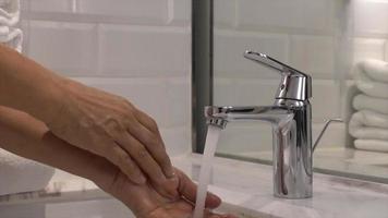 close-up tap or faucet in bathroom video