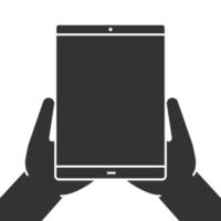 Hands holding tablet computer glyph icon. Silhouette symbol. Negative space. Vector isolated illustration