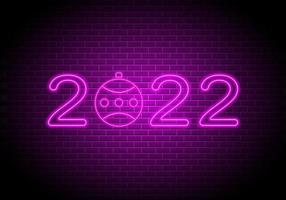 2022 neon numbers. New Year lightning sign on brick wall background vector