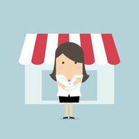 Businesswoman standing in front of the shop. vector