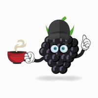 Grape mascot character holding a hot cup of coffee. vector illustration