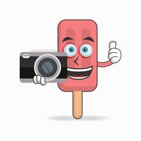 Red Ice Cream mascot character holding camera. vector illustration