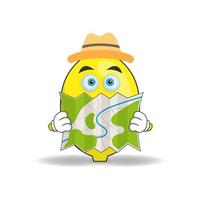 The Lemon mascot character holds a map. vector illustration