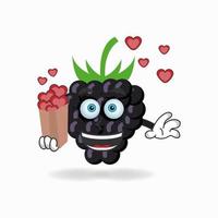 Personaje de mascota de uva sosteniendo un icono de amor. ilustración vectorial vector