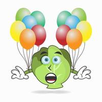 Cabbage mascot character holding a balloon. vector illustration
