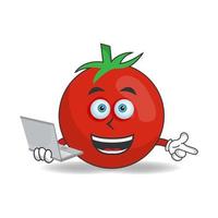 Tomato mascot character with laptop in right hand. vector illustration
