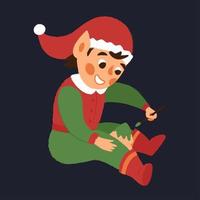feliz navidad elfo ayuda a hacer juguetes regalos vector