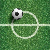 Soccer football ball on green grass of soccer field with center line area. Illustration graphic. photo