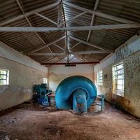 Cassilandia, Mato Grosso do Sul, Brazil, 2021 -Engine room of a abandoned small hydroelectric plant photo