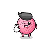 yarn ball character doing Korean finger heart vector