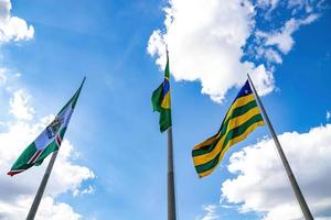 Goiania, Goias, Brazil, 2019 - Flags of the city of Goiania, state of goias and the Federative Republic of Brazil photo