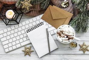 Flat lay Christmas home office photo