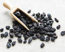 Black dried raisins photo