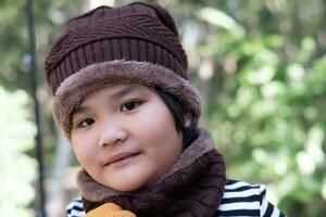Portrait of a cute little girl in wool hat photo