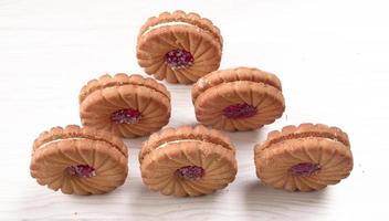 Top view of Sweet jam biscuits. Sandwich biscuits or Cream biscuits isolated. photo