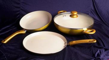Pots and pans. Set of cooking kitchen utensils and cookware. photo