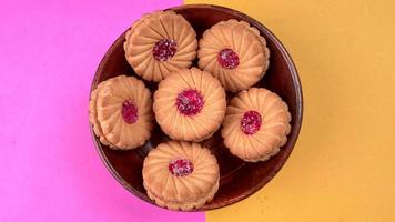 Top view of Sweet jam biscuits. Sandwich biscuits or Cream biscuits isolated. photo