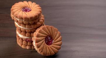 Top view of Sweet jam biscuits. Sandwich biscuits or Cream biscuits isolated. photo