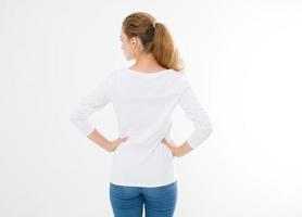 back view of young caucasian, europian woman, girl in blank white t-shirt. t shirt design and people concept. Shirts front view isolated on white background. Mock up. Copy space. photo