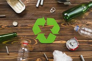 various reusable trash around recycling symbol photo
