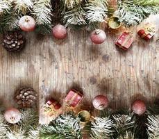 Merry Christmas frame with decoration over old wooden background photo