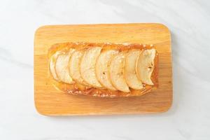 apple loaf crumbled on wood board photo